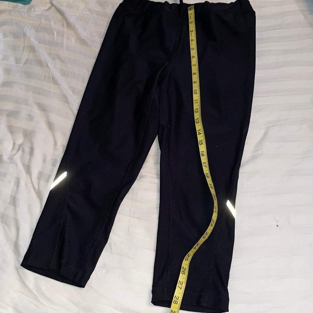 Xersion fitted 3/4 legging workout pant with back pocket reflective